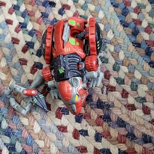 Dynamic Red and Gray Transforming Robot. RAT TRAP